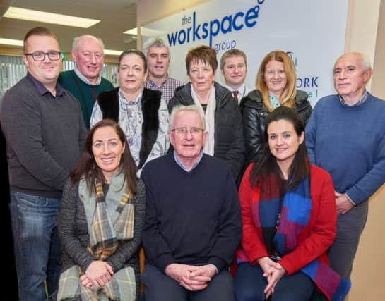 Patsy McShane, Workspace (front row, center) with representatives from local community and voluntary groups who recently received grants from the Workspace Community Fund.