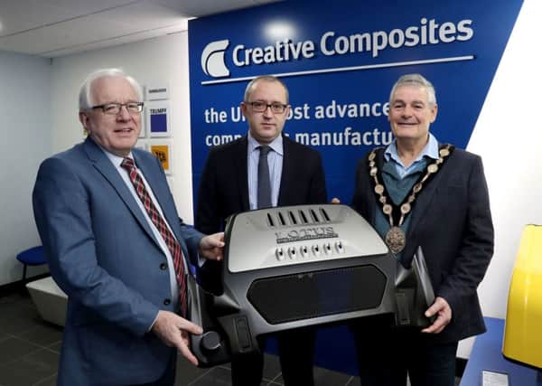 Creative Composites marked the start of 2018 by commissioning its fourth new compression moulding press, increasing production capacity and building on its reputation as the UKs most advanced composite manufacturer. Pictured (l-r) are Alderman Allan Ewart MBE, Chair of the council's Development Committee; Jonathan Holmes, Managing Director of Creative Composites and Mayor Tim Morrow.