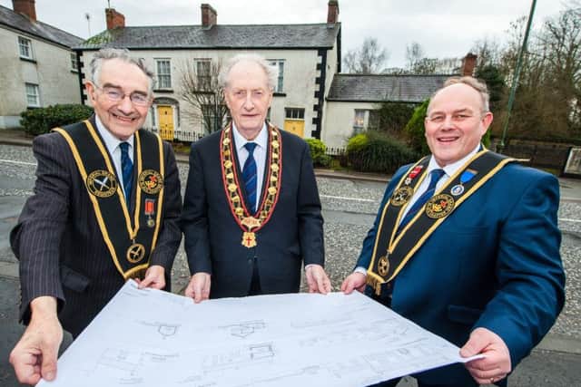 Billy Scott, imperial grand registrar, Millar Farr, sovereign grand master, and David Livingstone, imperial grand treasurer, outside the Royal Black Institutions new headquarters in Loughgall