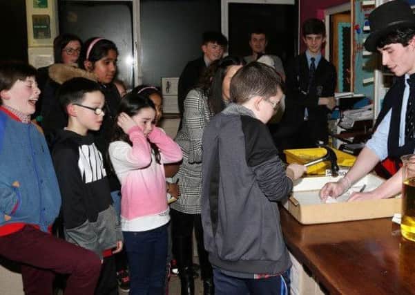These young visitors were treated to a science demonstration in one of the St Louis Grammar labs during and Open Night.