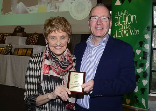 Alan Beattie recently retired teacher and Charity co coordinator (Ballyclare Secondary) was presented with a plaque for his many years of support to the charity.