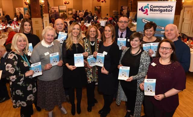 Staff, guest speakers and MLAs at the launch of the Community Navigator scheme in the Glenavon House Hotel.