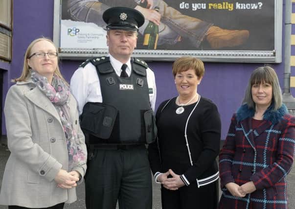 Where Is You Child Tonight Campaign Launch: Alison Clengahan PCSP Manager, Inspector Brian Mills, Councillor Maire Cairns Chair PCSP and Lynette Cooke PSCP Development Officer at the billboard featuring the campaign. Â©Edward Byrne Photography