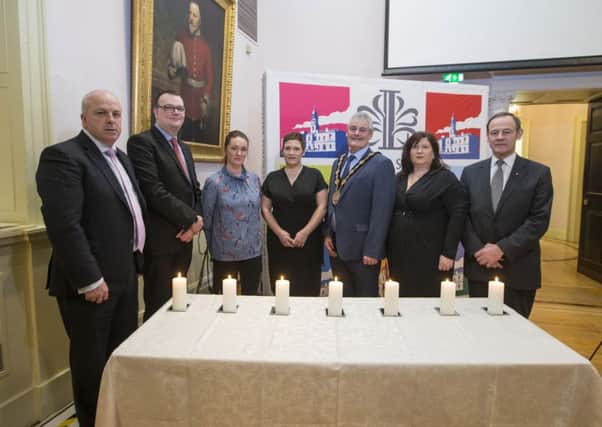 Pictured at the Lisburn Holocaust Memorial Day event are: (l-r) Alderman James Tinsley, Chairman of the Council's Leisure & Community Development Committee; Ryan Black, Head of Culture & Community Services; Paula Ashe, Lisburn Community Hub; Amanda Kelly, Dundonald Ladies Group; the Mayor, Councillor Tim Morrow; Denise Hughes, Institute for Conflict Research and Freddie Hall MBE, Deputy Lord Lieutenant of County Antrim.