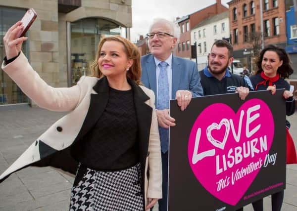 Chairman of the Council's Development Committee, Alderman Allan Ewart MBE alongside city centre traders launching the Love Lisburn Love Valentine's competition.