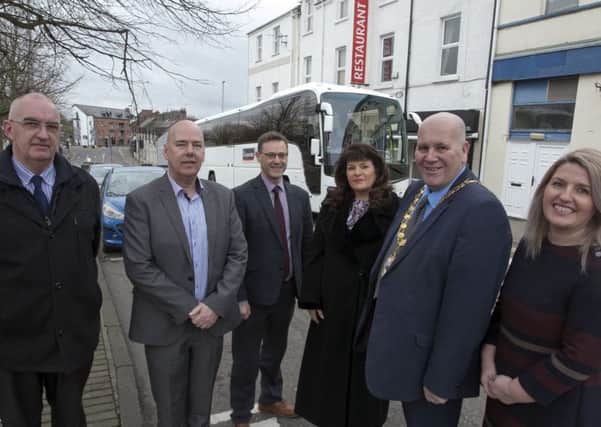 Cllr Paul Reid, pictured at the coach drop off point with Karen Magill, Chief Executive of Federation of Passenger Transport Northern Ireland (FPTNI), Coach Drver and FPTNI Chairman, Alan Davidson, Sean Trainor, Economic and Tourism Development Manager (MEA BC), Philip Thompson, Director of Operations (MEA BC) and Linda Williams, Director of Economic Growth, Regeneration and Tourism (MEA BC).