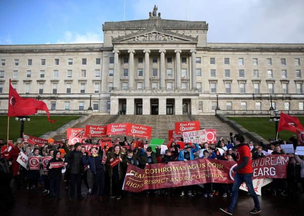 Irish language act campaigners, including pupils from Irish-medium schools across Northern Ireland, take part in a protest at Stormont parliament buildings in Belfast this month, ahead of a meeting with Northern Ireland Secretary Karen Bradley. Photo: Brian Lawless/PA Wire