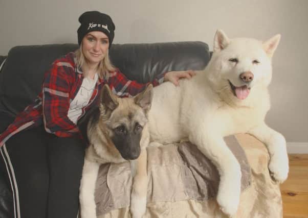 Tara pictured with her dogs.