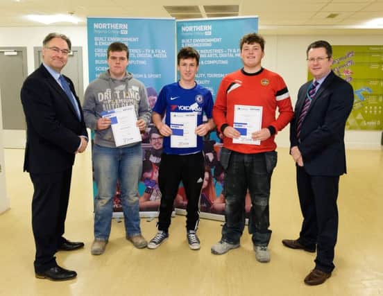 Some of the Northern Regional College apprentices who participating in the SkillbuildNI intercampus competition at the Colleges Newtownabbey campus, from left to right, David Cooper, CITB NI chairman, Andrew McSorley, Newtownabbey (2nd place), Derek McMullan (1st place), Farm Lodge, Brandon Grant (3rd place), Farm Lodge and Matt Murray Head of Engineering and Built Environment at the College.