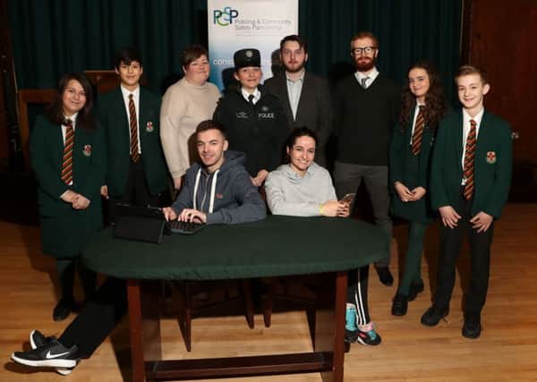 Pictured at the recent Lisburn and Castlereagh PSCP Internet Safety event are pupils and teachers from Friends' School Lisburn with Councillor Aaron McIntyre, Chairman of Lisburn and Castlereagh PCSP; Constable Heather Crompton, PSNI; Jenny Magee and actors from C21 Drama Group.