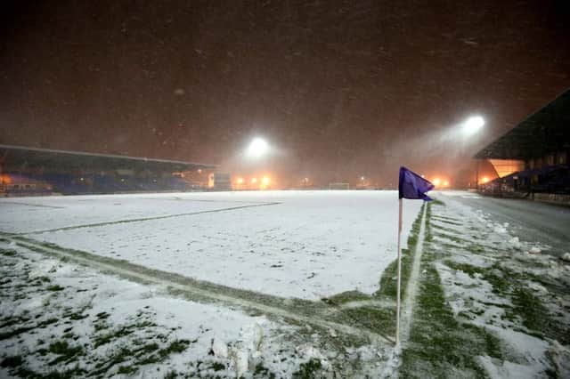 The scene at Ballymena Showgrounds on Tuesday night when the pitch was deemed unplayable due to snow and ice.  Mandatory Credit Â©INPHO/Matt Mackey