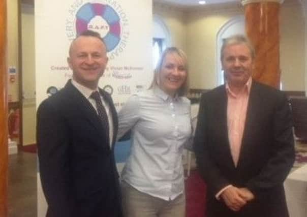 Hope Centre Project Co-ordinator Ben Delija at the Let's Get Together Conference in Ballymena with Vivian McKinnon and
DR Gregg
