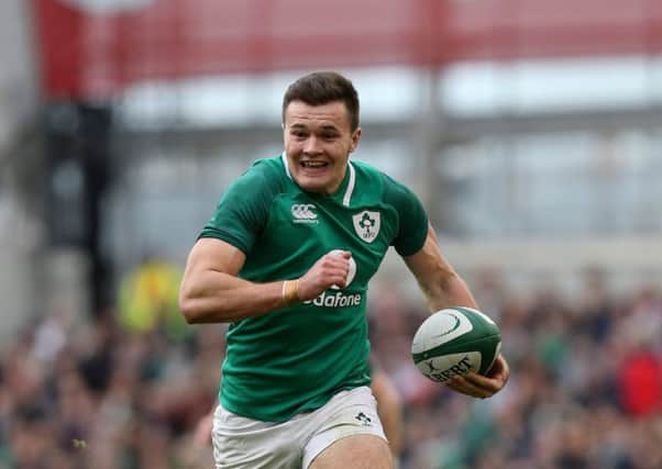 Jacob Stockdale runs in for a second try against Italy