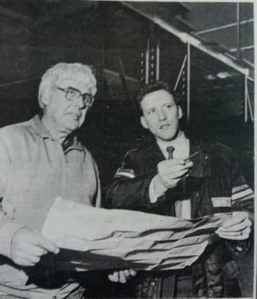 Raymond Beatty, Sperrin Metal products marketing manager, checking some final details in January 1989 with Bill Brock (left) the site manager at Texas Homecare at Sprucefield. Sperrin  had just won a major contract worth  Â£100,000.