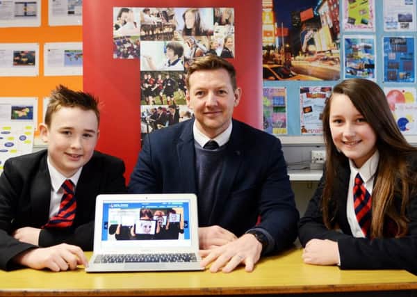 Mr Shaw pictured with Ballyclare High pupils.