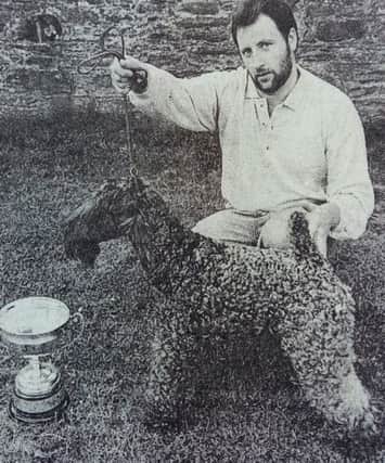 John Doherty from Rosemount Avenue with his three-year-old Kerry Blue Terrier 'Louisburgh Suits Me Fine' who came first in the open dog class, best overall in the show and Green Star dog at the Dublin Irish Blue Terrier Championship in June 1989.