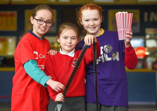 Members of the local Into Film Club had the opportunity to attend a film review-writing workshop and a private screening of the new animation 'Coco'at the IMC, Ballymena. Pictured are (l-r) Keera from Carnlough Integrated Primary School; Grace, Ballycraigy Primary School, Antrim; and Martha, Ballykeel Primary School, Ballymena.