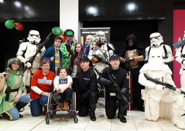 Natascha pictured with members of The Emerald Garrison at the event in Abbey Centre.