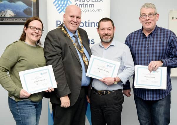 The Mayor of Mid and East Antrim Cllr Paul Reid presenting the certificates to Good Relations Graduates  Lisa Kirkwood, Alistair Donaghy and Stephen Brown