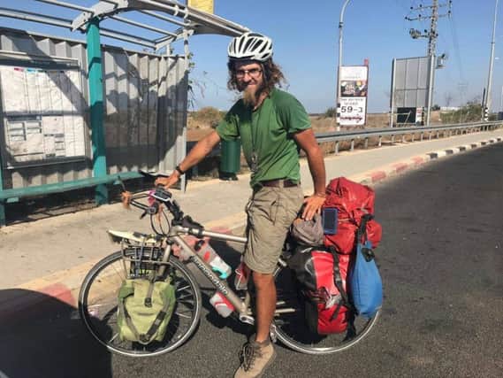 Oliver McAfee from Dromore in Co Down has gone missing while on a cycling trip around Israel.