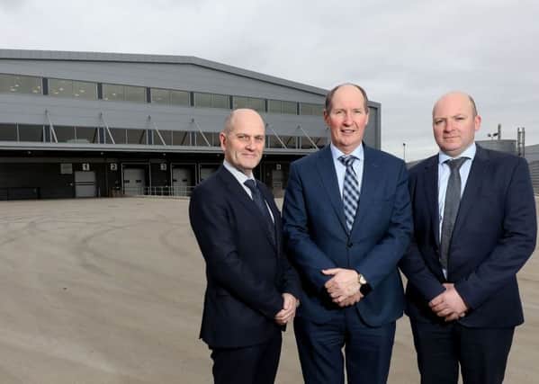 Dr Robert Dunlop, President & Managing Director, Almac Clinical Services; Alan Armstrong, Chairman & CEO, Almac Group, and Graeme McBurney, President & Managing Director, Almac Pharma Services at the new facility at Almac's global headquarters in Craigavon.