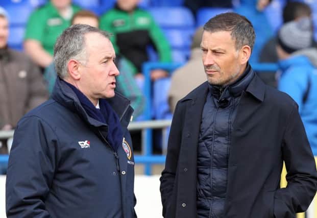 Mark Clattenburg chats with Coleraine FC Chairman Colin McKendry before the game at Coleraine Showgrounds. Picture by Dessie Loughery/Pacemaker Press