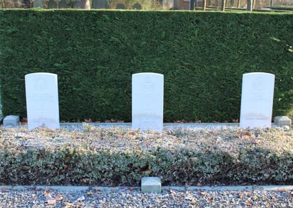 The three war graves adopted by Ilse at the cemetery in Kloosterzande.