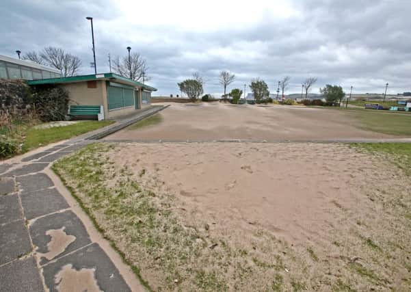 02/03/18 McAuley Multimedia.. The scene at Ballycastle Bowling green on Friday afternoon after the recent storm has swept over 6 inches of sand from the beach onto the near by bowling green. Pic Steven McAuley/McAuley Multimedia