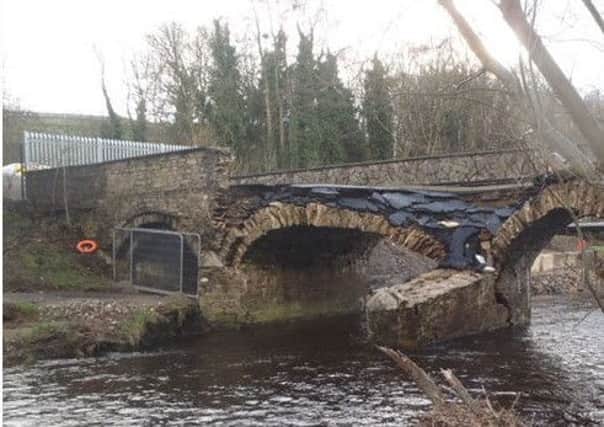 The damage to the Ballynameen Bridge caused by last August's flooding