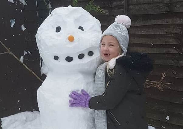 Lacey-Beth age 6 with Olaf.