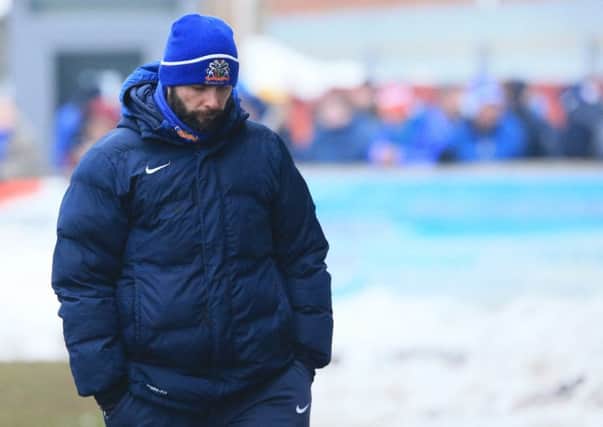 A dejected Glenavon manager Gary Hamilton