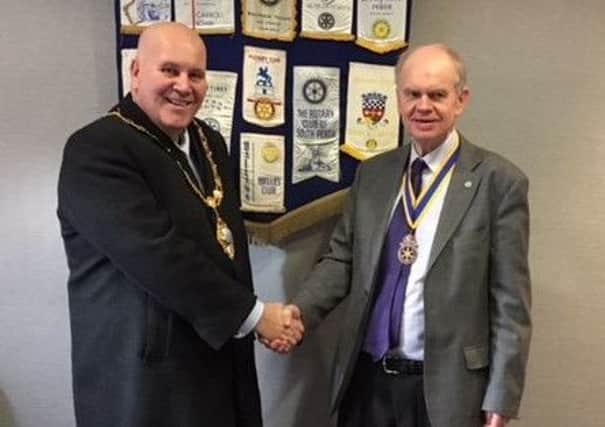 Jim Dunlop (right), president of Carrickfergus Rotary, welcomes the Mayor of Mid & East Antrim Council, Councillor Paul Reid, as guest speaker to the club.
