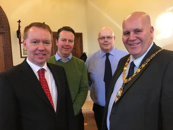 At a recent reception, the Mayor raised his concerns with Transport NI officials about winter gritting, pot holes, road maintenance, street lighting, grass cutting and budget constraints. Here he is with David Porter (Divisional Roads Manager), Gary Quinn and Stephen Millar.