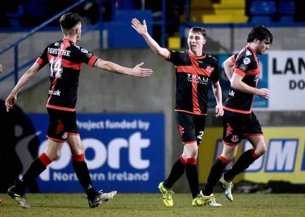 Crusaders Gavin Whyte celebrates after scoring a penalty against Glenavon