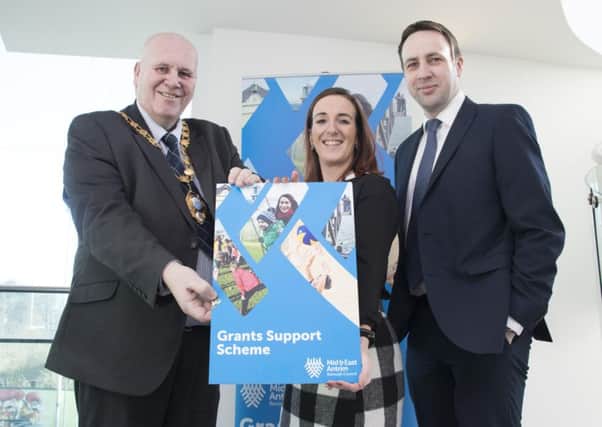 The Mayor Cllr Paul Reid pictured alongside council officers Christine Barnhill and James Healy.