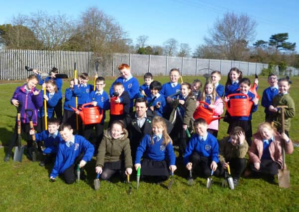 Pupils at St Francis' PS ready to get gardening at their new allotment
