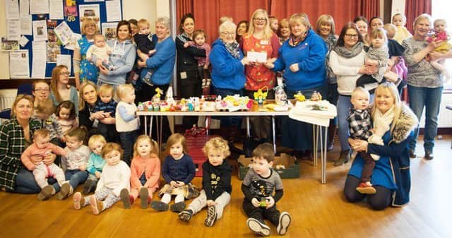 Adeline Alexander and Hengie Dawson from Radio Cracker came along to St Patricks Mother and Toddler group to sell their Easter knitted gifts. Group leader Dorothy Ross presented them with a donation for Radio Cracker on behalf of the Mothers & Toddler group.