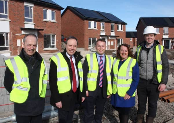 North Belfast MP Nigel Dodds, Paula Bradley MLA and Councillor Thomas Hogg with Ray Forbes, Director of Development and Procurement, Apex Housing Association, left, and Michael McBride, MJ McBride Construction, right, at the construction site for 25 new social houses by Apex at Derrycoole Park, Rathcoole.