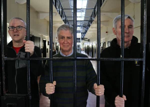 Dean Sam Wright of Lisburn Cathedral (right) with Roy Totten and Neville Jones in Crumlin Road Gaol.