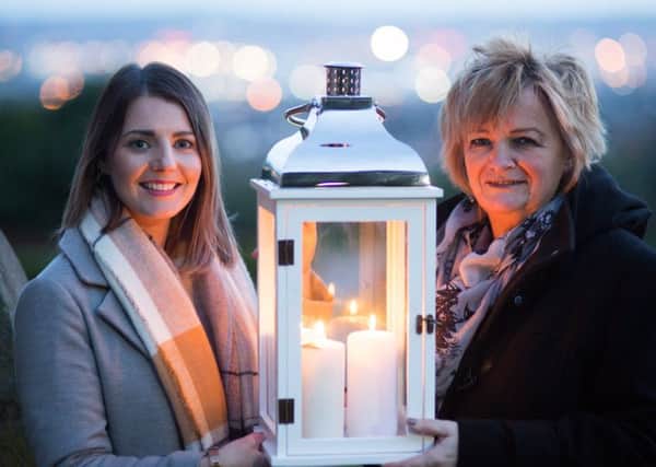 Rochelle Magee, Head of Charity Committee firmus energy and Jo Murphy, Co-Ordinator Lighthouse.