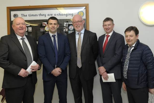 Education Authority chief executive Gavin Boyd (centre) pictured with Declan Brennan (Woodvale Construction Contracts Manager), Colin Bingham (EA Project Manager), Declan Robin Sloane (EA Clerk of Works) and Dessie Brennan (Woodvale Construction). Â©Edward Byrne Photography INBL1811-241EB