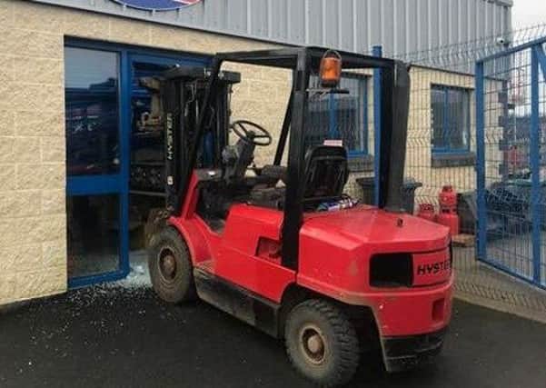 The forklift truck was rammed through the door and metal shutter at MFL Plant Machinery. Pic by PSNI Magherafelt