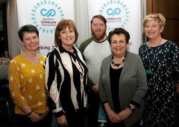 Representatives from the East Antrim area who attended the Northern Childcare Partnership conference included (left from right): Karen Jenkins, Glenroe Preschool, Larne; Margaret Armstrong, Horizon Surestart; Thomas ONeill, CNAG; key speaker Adrienne Burgess, Fatherhood Institute; and Jenny Adair, Northern Childcare Partnership.