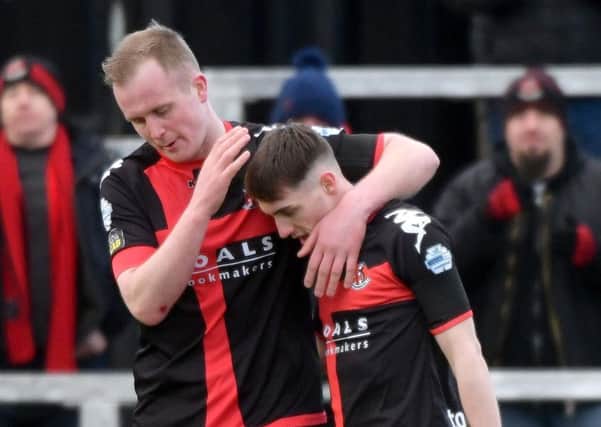 Crusaders Gavin Whyte celebrates his second goal of the day against Dungannon Swifts. Â©INPHO/Stephen Hamilton