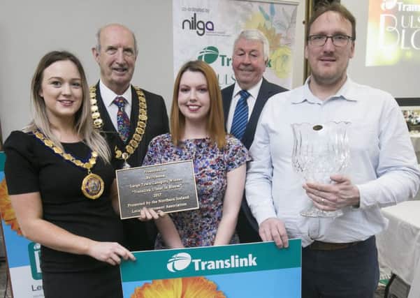 Celebrating success at the Translink Ulster in Bloom 2017 Awards in which Ballymena won the Large Town Award, and the Roses inTownsTrophy are from left: Cllr Cheryl Johnston, Deputy Mayor, Alderman Arnold Hatch, President, Northern Ireland Local Government Association, Alison Diver, Mid and East Antrim Borough Council, Frank Hewitt, Translink Chairman, and Noel Robinson, Mid & East Antrim Borough Council.