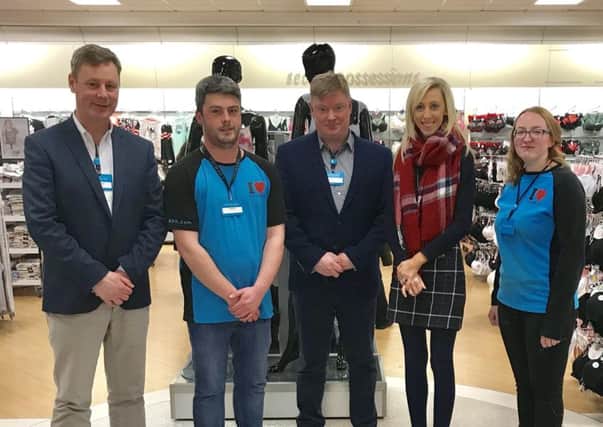 Area Manager Mr Neale Kirk  with Carla Lockhart MLA and other Primark staff.