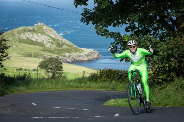The sun shining on a cyclist at the infamous Torr Head climb. PICTURE: Warren McConnaughie