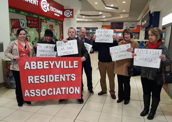 Members of the Abbeyville Residents Association conducted a protest against parking charges at the Abbey Centre.