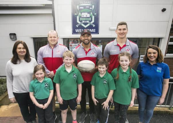 Pupils from Tildarg Primary won a training session with Ulster Rugby players Charles Piatau, Robbie Diack and Callum Black.