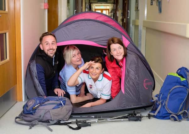 Getting the tent tested out for the Southern Area Hospice Cambodia Trek to Angkor Wat from 19 - 27 October 2019 are from left: James McCaffrey, Regional Marketing Officer; Diane Jardine, Auxilary Nurse; Jenna Douglas, Nursing Student  and Anne MacOscar, Regional Marketing Officer. Photograph: Columba O'Hare/ Newry.ie